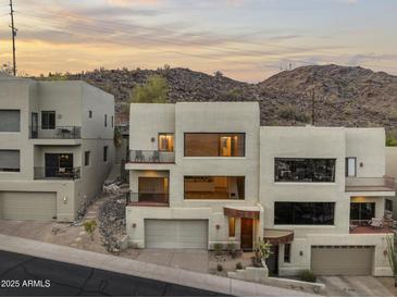 Stunning exterior elevation features balconies, multiple garages, and unique architecture at 36 W Foothill Dr, Phoenix, AZ 85021