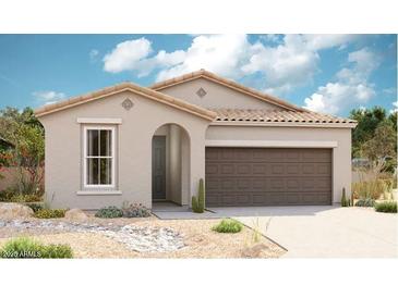 Charming single-story home showcasing a neutral color palette, desert landscaping, and a two-car garage at 18508 E Dario Rd, Gold Canyon, AZ 85118