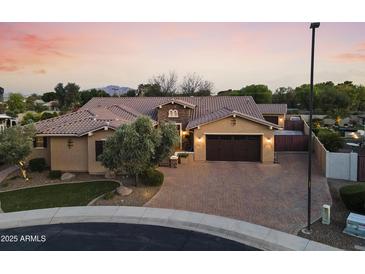 Stunning single-story home boasts tile roof, mature landscaping, and a spacious driveway at 3381 E Azalea Dr, Chandler, AZ 85286