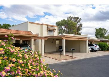 Charming single-story home with covered parking, desert landscaping and curb appeal at 2434 W Eugie Ave, Phoenix, AZ 85029