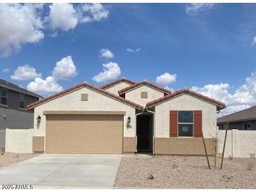 Charming single-story home with a two-car garage and neutral-colored exterior at 7320 E Hackamore Ln, San Tan Valley, AZ 85143