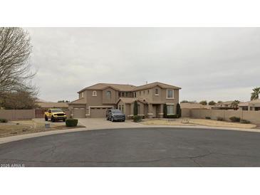 Stunning two-story home featuring desert landscaping, a multi-car garage and private drive in a desirable neighborhood at 5508 N 83Rd Dr, Glendale, AZ 85305