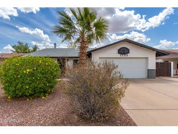 Charming home featuring a desert landscape and a well-maintained lawn at 1153 W Mesquite St, Chandler, AZ 85224