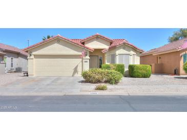 Charming single-story home featuring a well-maintained front yard and desert landscaping at 2380 E Seville Ct, Casa Grande, AZ 85194