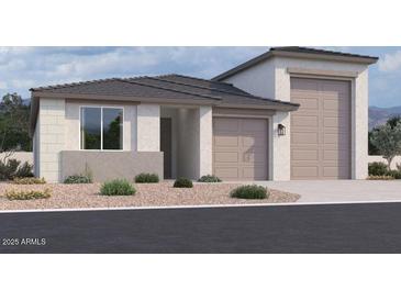 Charming single-story home with a two-car garage and low-maintenance landscaping at 32139 N Lone Rancher Way, San Tan Valley, AZ 85140