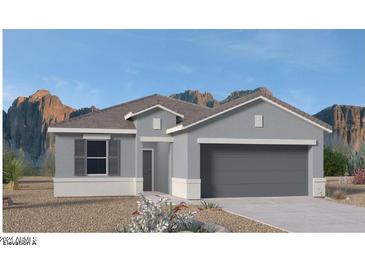 Charming single-story home with a two-car garage, neutral color palette and desert landscaping at 1343 W Hess Ave, Coolidge, AZ 85128