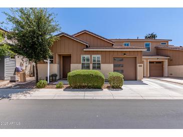 Charming single-Gathering home boasts a well-manicured yard and an attached one-car garage at 1931 E Lantana Dr, Chandler, AZ 85286