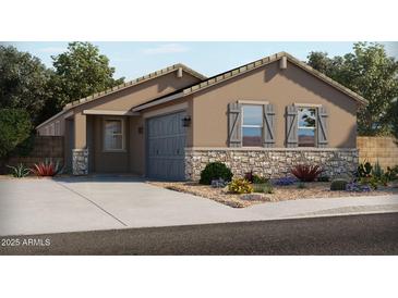 Charming single-story home boasts stone accents, gray shutters, and desert landscaping at 2674 E Santa Rosalia Dr, Casa Grande, AZ 85194
