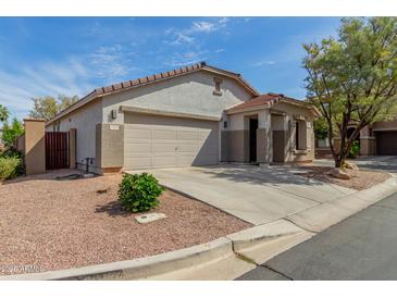 Charming single-level home with a well-manicured yard and two car garage at 2701 S Southwind Dr, Gilbert, AZ 85295