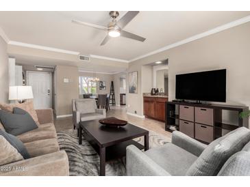 Comfortable living room with ceiling fan, and dining area view at 8250 E Arabian Trl # 120, Scottsdale, AZ 85258