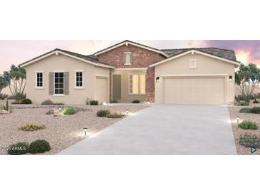 Charming single-Gathering home featuring a stone facade, two-car garage, and desert landscaping at 19019 W Ocotillo Rd, Waddell, AZ 85355