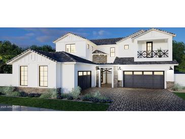 Stunning two-story white home featuring a brick driveway and a private entry gate at 2541 E Presidio St, Mesa, AZ 85213