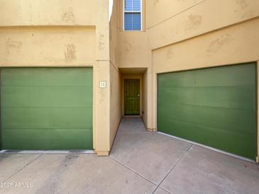 Charming townhome featuring attached garage, front entry and neutral color scheme at 5015 E Cheyenne Dr # 14, Phoenix, AZ 85044