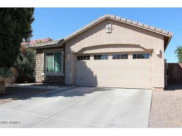 Charming single-story home featuring a two-car garage and well-maintained landscaping at 3850 E Balsam Dr, Chandler, AZ 85286
