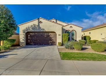 Charming single-story home featuring a well-manicured lawn, two-car garage, and inviting curb appeal at 3566 S Colorado St, Chandler, AZ 85286