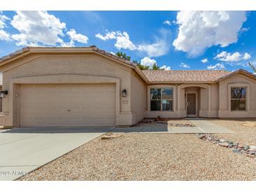 Charming single-story home with a two-car garage and low maintenance desert landscaping at 6372 S Callaway Dr, Chandler, AZ 85249