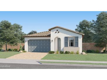 Charming single-story home with a two-car garage, stucco siding, and a tile roof surrounded by lush landscaping at 4975 S 233Rd Dr, Buckeye, AZ 85326