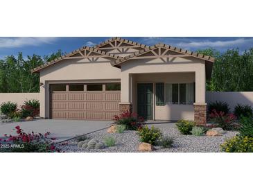 Charming single-story home with a two-car garage and well-manicured landscaping at 776 N Don Frank Ln, Wickenburg, AZ 85390