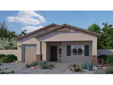 Charming single-story home boasts a well-manicured front yard and inviting facade at 795 N Don Frank Ln, Wickenburg, AZ 85390