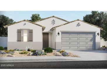 Charming one-story home with a two-car garage, stucco walls, and a well-maintained front yard at 3778 N Camden Dr, Florence, AZ 85132