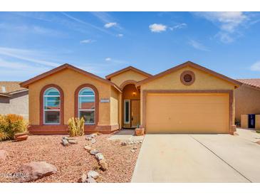 Charming single-story home with a desert-landscaped front yard and an attached two-car garage at 6831 S Coral Gable Dr, Chandler, AZ 85249