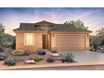 Charming single-story home with a tile roof and low maintenance desert landscaping in the front yard at 21304 N 271St Dr, Buckeye, AZ 85396