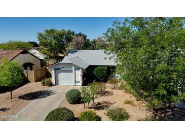 Charming single-story home featuring a well-maintained front yard and attached one car garage at 3106 W Mohawk Ln, Phoenix, AZ 85027