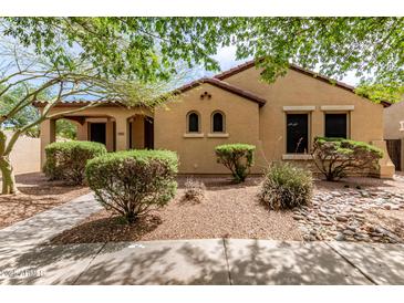 Charming single-story home featuring desert landscaping and a welcoming covered porch at 1843 S Sunnyvale Ave, Gilbert, AZ 85295