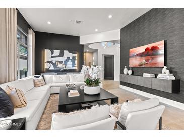 Stylish living area features modern decor, sleek furniture, and an open layout at 15240 N Clubgate Dr # 137, Scottsdale, AZ 85254