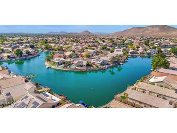 Gorgeous aerial shot of waterfront community with lake views and manicured landscaping at 5252 W Pontiac Dr, Glendale, AZ 85308