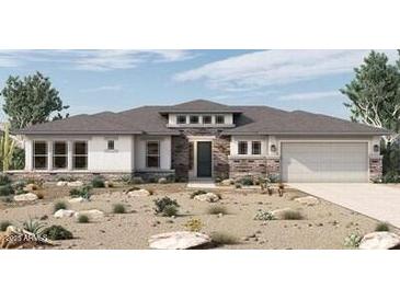 Charming single-story home with stone accents, desert landscaping, and a two-car garage at 20847 W Montebello Ave, Buckeye, AZ 85396