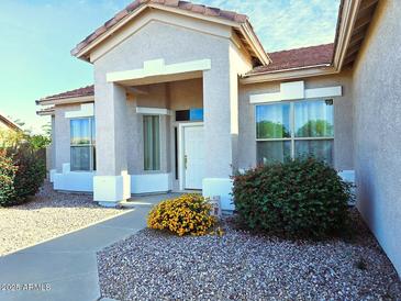 Charming single-story home with well-maintained landscaping and a welcoming front entrance at 1210 E Westchester Dr, Chandler, AZ 85249