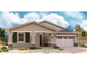 Charming single-story home with neutral colors, stone accents, two-car garage and well-maintained landscaping at 21838 E Bonanza Ct, Queen Creek, AZ 85142