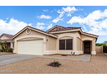 Inviting single-Gathering home featuring a low maintenance yard and an attached two-car garage at 900 E Saratoga St, Gilbert, AZ 85296