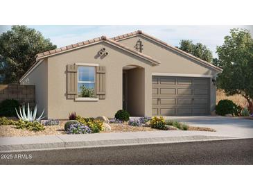 Charming single-story home with desert landscaping and a two-car garage at 349 S Calle Miguel --, Casa Grande, AZ 85194