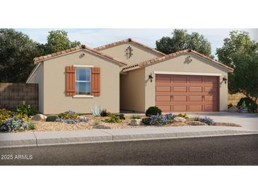 Charming single-story home with a two-car garage and desert landscaping, featuring tan stucco and a red tile roof at 355 S Calle Miguel --, Casa Grande, AZ 85194