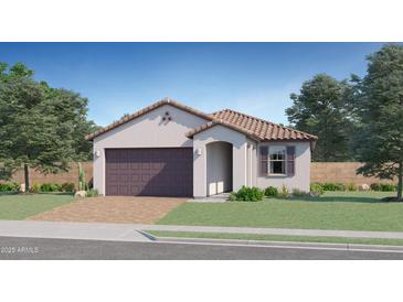Charming single-story home with a tiled roof, two-car garage, and a well-manicured lawn at 15597 W Williams St, Goodyear, AZ 85338