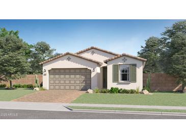 Charming single-story home with a brick driveway, two-car garage, and well-maintained landscaping at 3141 S 155Th Ln, Goodyear, AZ 85338