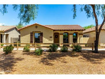 Charming single-story home with a well-maintained front yard and desert landscaping at 4495 E Woodside Way, Gilbert, AZ 85297