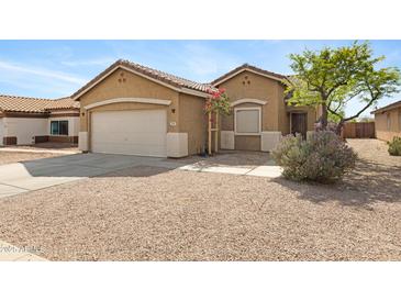 Charming single-story home with a two-car garage and desert landscaping at 204 S Valle Verde --, Mesa, AZ 85208