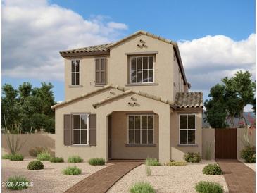 Charming two-story home featuring a tile roof, neutral stucco, and inviting landscaping at 26119 N 23Rd Ave, Phoenix, AZ 85085
