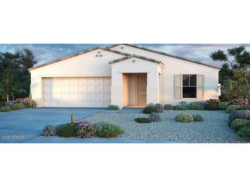 Charming single-story home with desert landscaping and a neutral color palette at 5428 W Jackalope Ln, Laveen, AZ 85339
