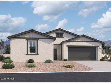 Charming single-story home featuring a neutral color palette and a two-car garage, offering comfort and curb appeal at 47253 W Pecan Woods --, Maricopa, AZ 85139