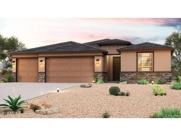 A home with a neutral color scheme, stone accents, and a three-car garage is showcased at 17747 W Fulton St, Goodyear, AZ 85338