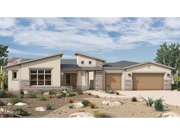 Stunning single-story home boasting desert landscaping, a two-car garage, and contemporary architecture at 18141 E Silver Creek Ln, Queen Creek, AZ 85142