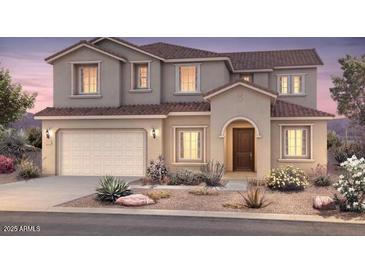 Beautiful two-story home featuring a neutral color scheme, manicured landscaping and a two car garage at 22450 E San Tan Blvd, Queen Creek, AZ 85142