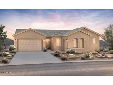 Charming single-story home featuring a two-car garage and desert landscaping against a beautiful sunset backdrop at 22528 E San Tan Blvd, Queen Creek, AZ 85142