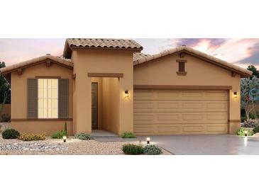 Charming single-story home boasts a neutral color palette, tile roof, and a well-manicured, low maintenance desert-style front yard at 2158 S 242Nd Ln, Buckeye, AZ 85326