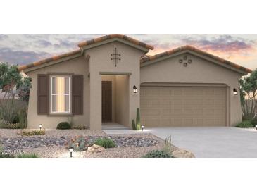 Charming single-story home with a two-car garage, desert landscaping, and a neutral color palette at 31752 N 116Th Dr, Peoria, AZ 85383