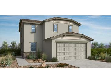 Charming two-story home featuring a neutral color palette, multi-car garage and well manicured front yard at 25148 N 167Th Ave, Surprise, AZ 85387